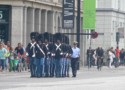 The Queen's Guard marches down the street to the palace